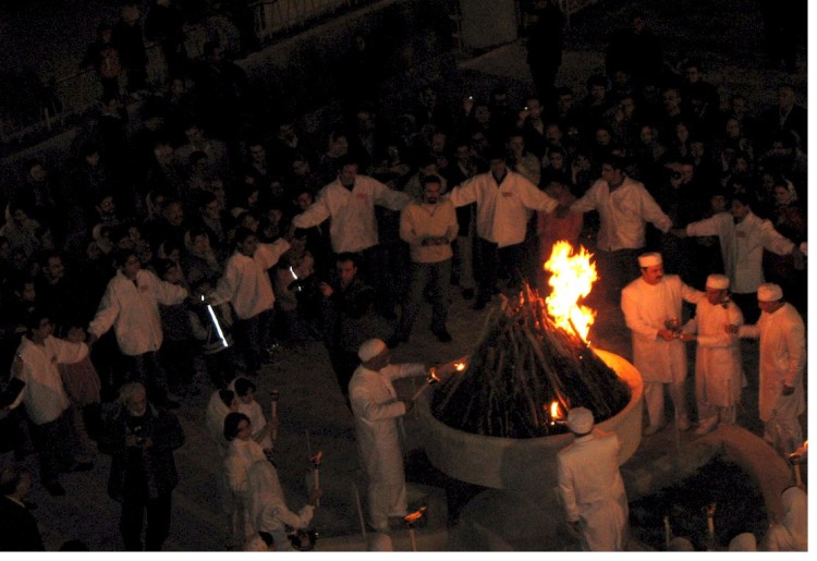 Zoroastrians priests (in white) and public fire-worship
